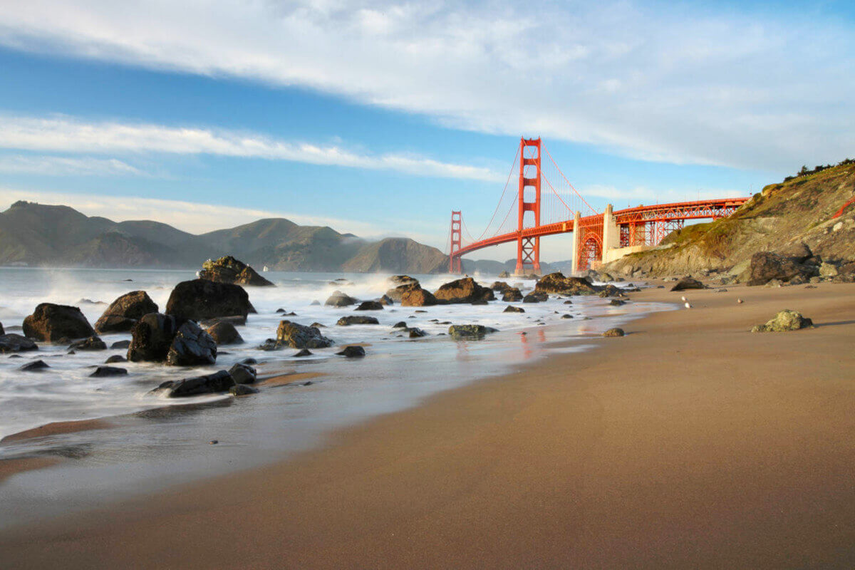 Golden Gate Bridge from a rocky beach